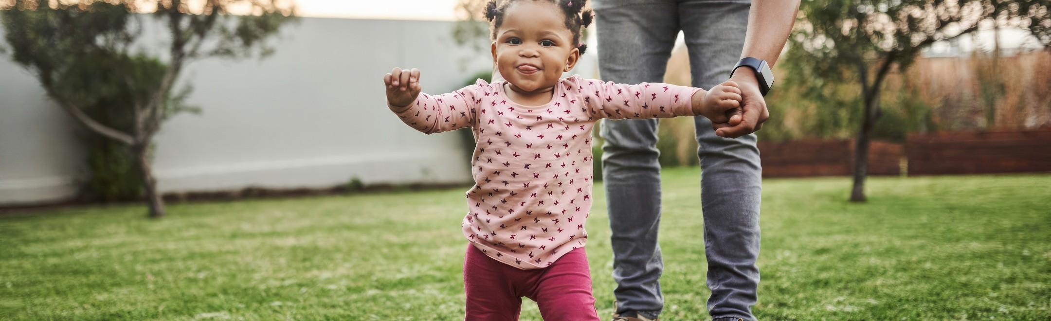 A childhood milestone, a child learning to walk