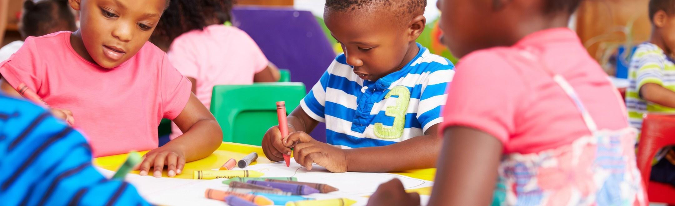 Children coloring in books