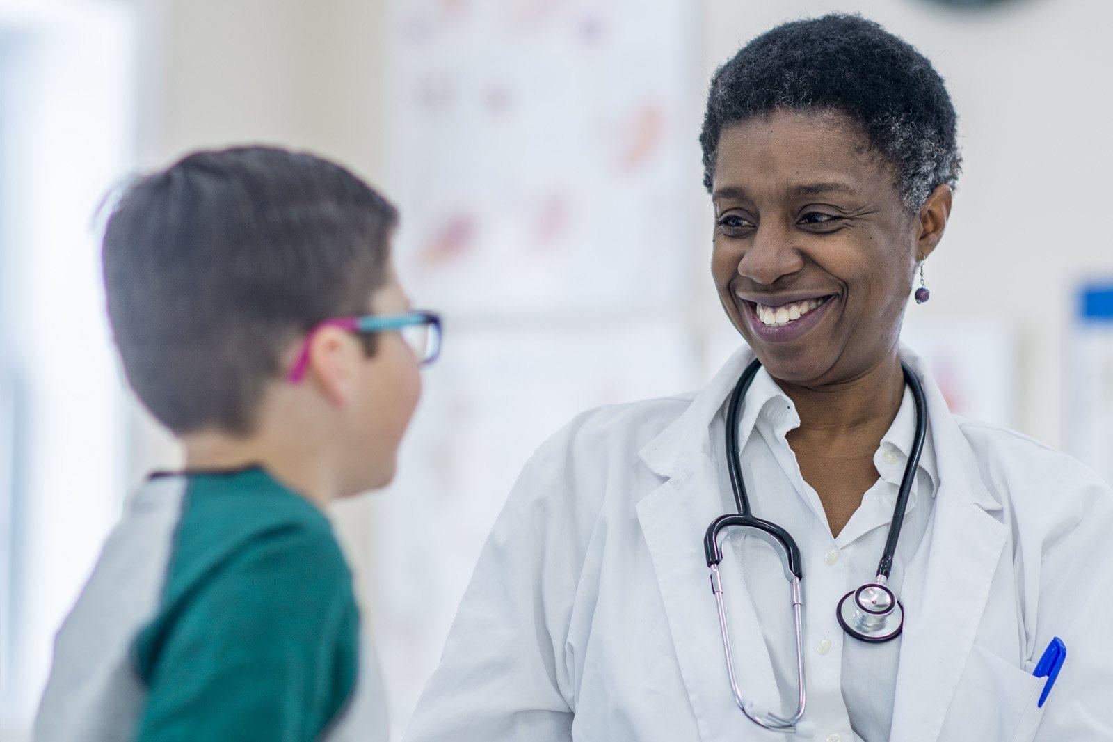 Doctor smiling at a child