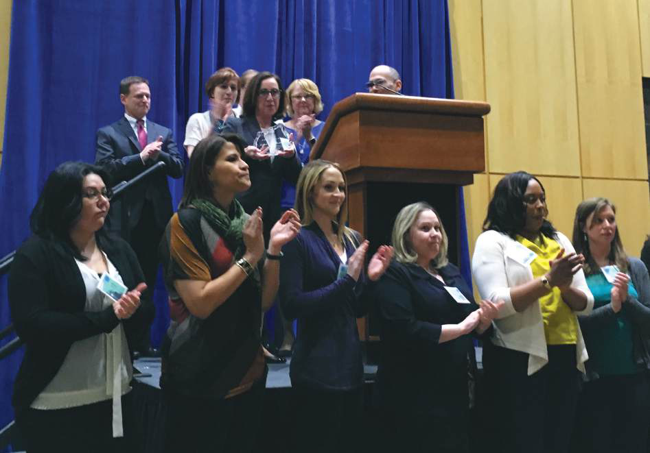 Community partners gathered at a 2019 event