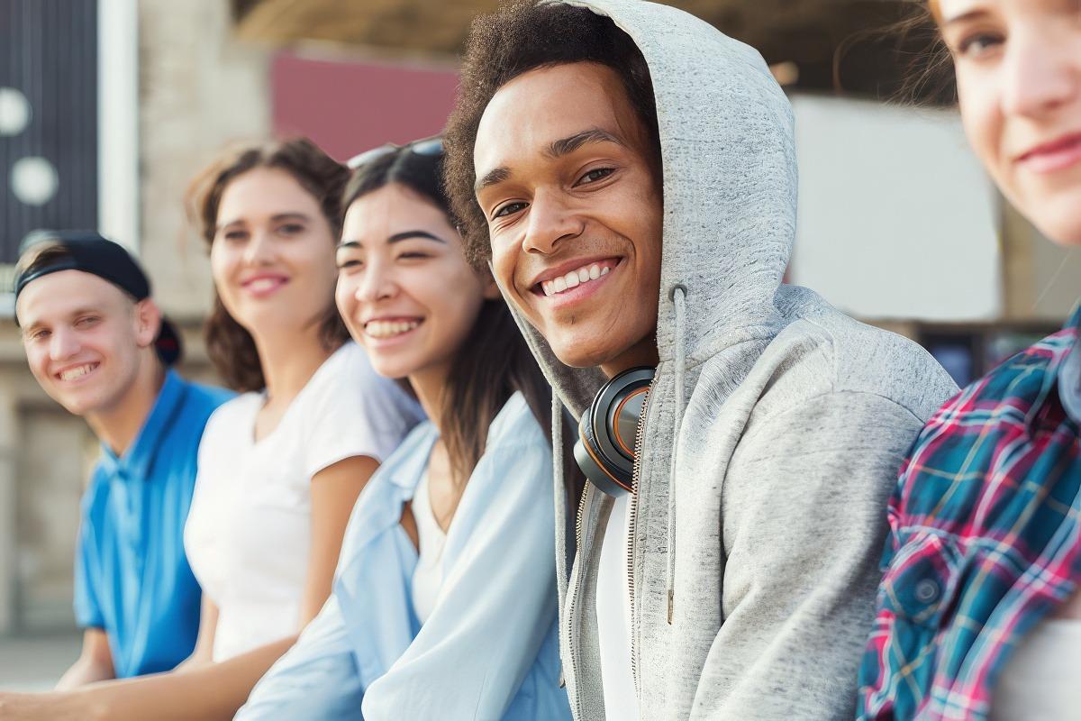 Three teens smiling as they take charge of their lives with a Life Plan