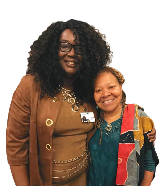 Two leaders embracing at a DHMIC event
