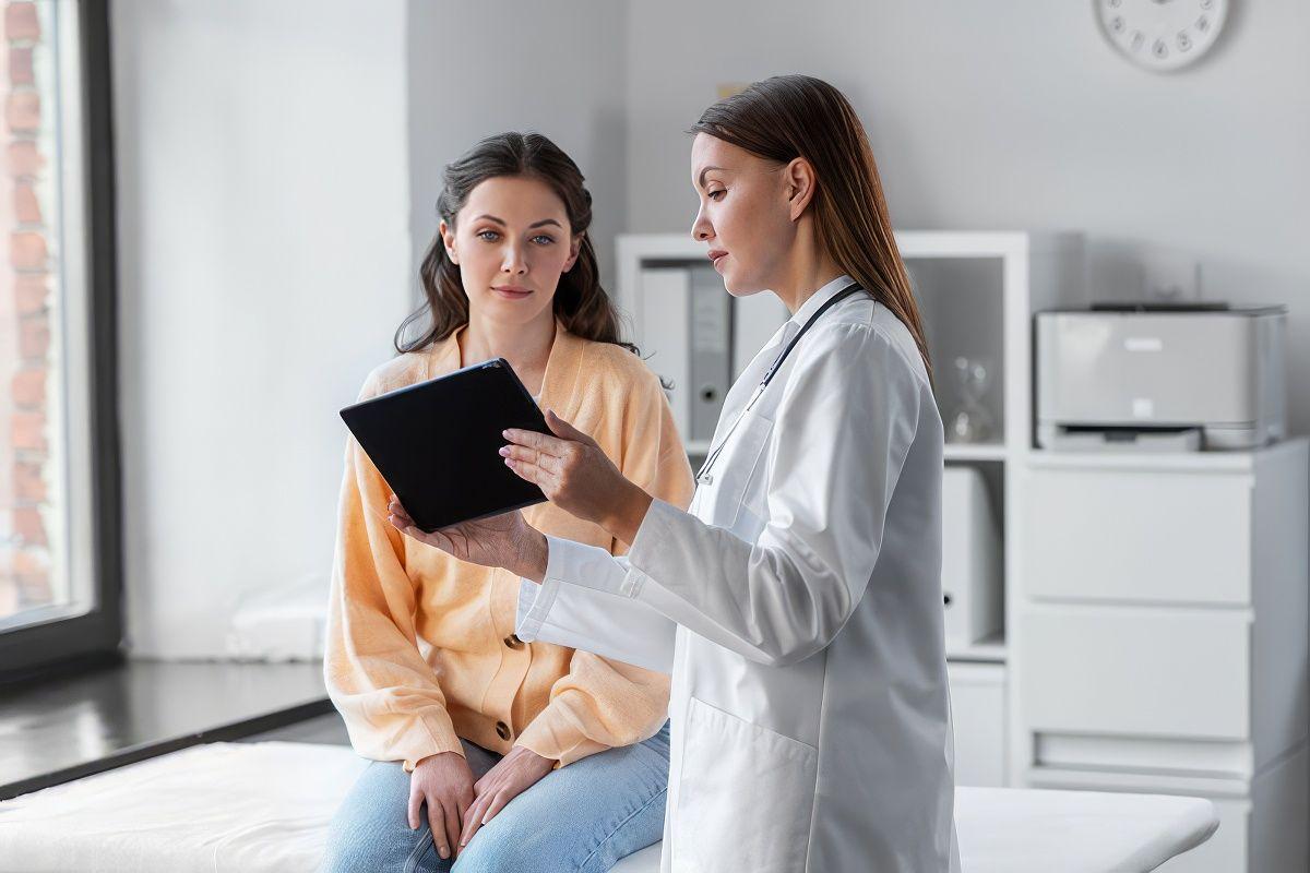 Female doctor reviewing birth control options with woman
